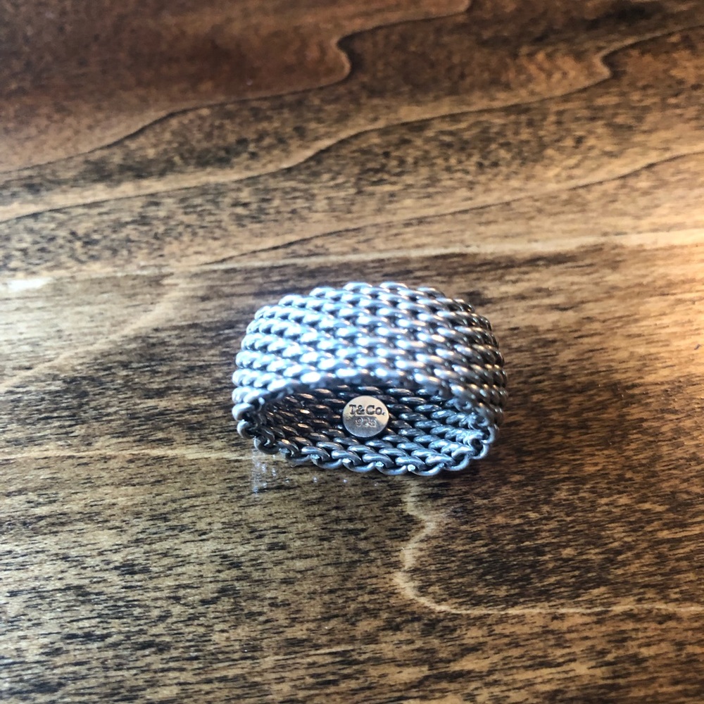 Authentic Tiffany and Co wide mesh ring.